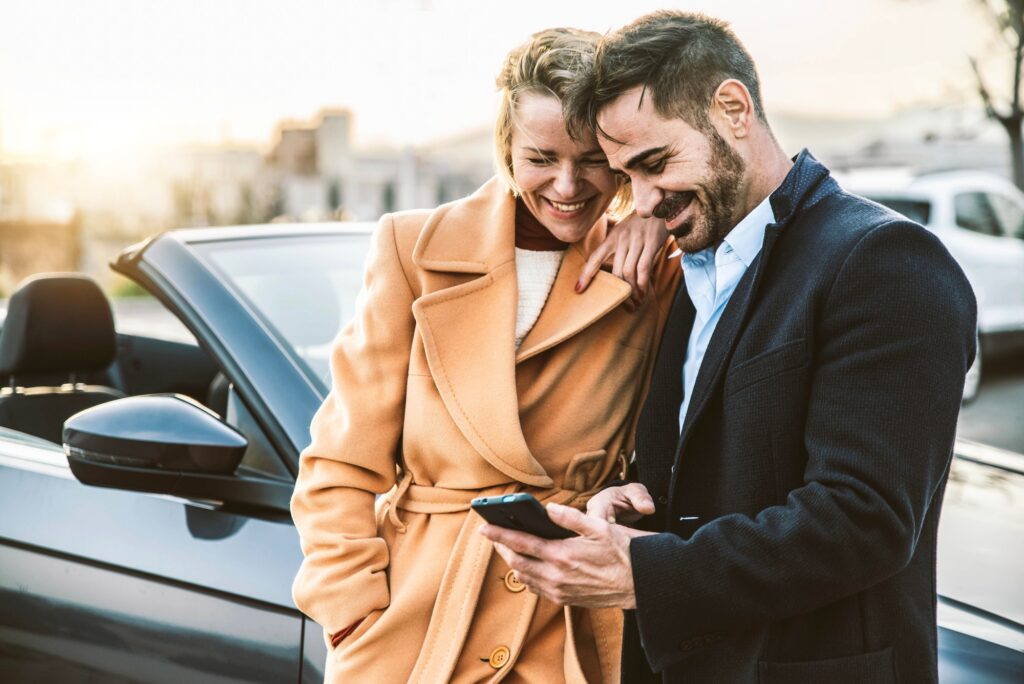 Happy tourists rents car on vacation